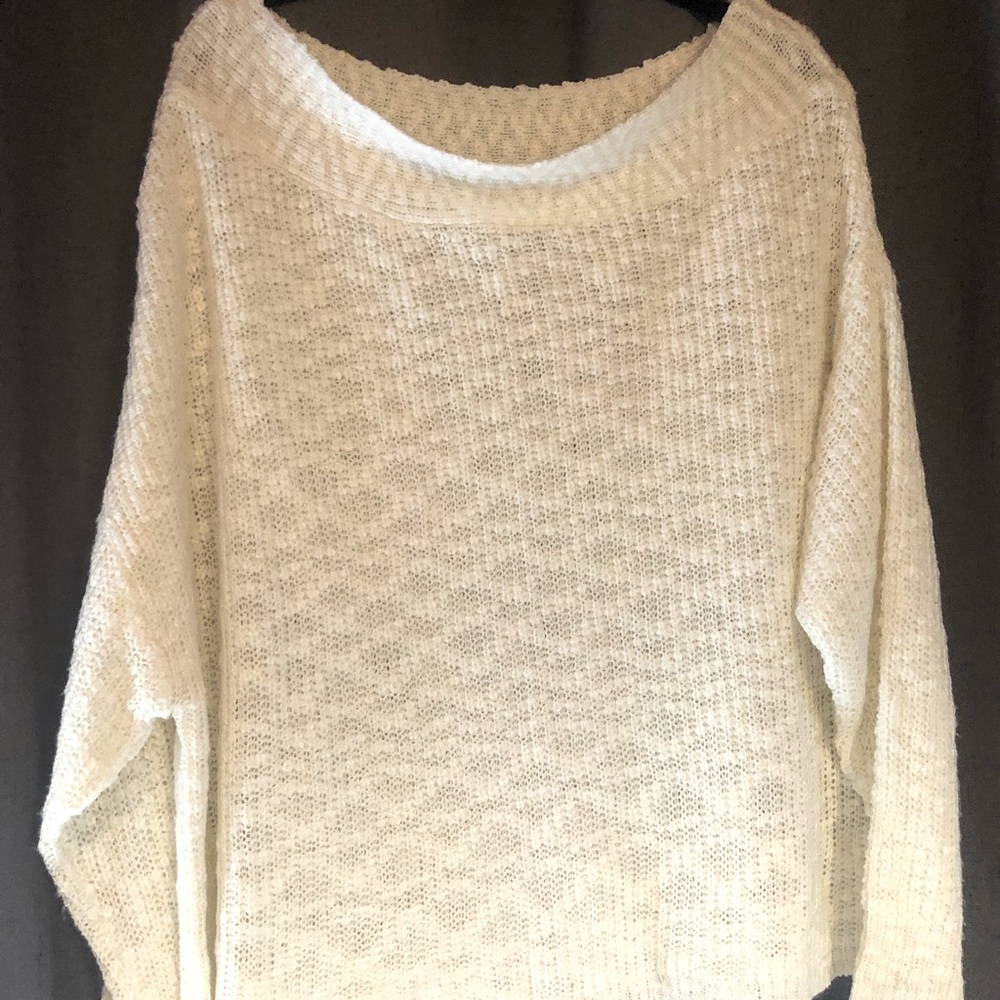 Cream off the shoulder sweater.